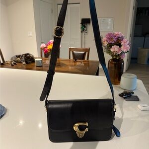 Coach Black Shoulder Bag with Gold Accents